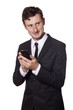 businessman twitters with a smartphone