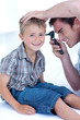 Doctor checking a patient' s ears