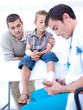 Doctor bandaging a patient's foot