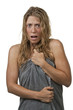 Woman gets out of the shower, scared