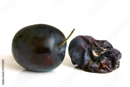 Photo: Fresh plum and rotten plum Fresh plum and rotten plum