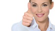 Beautiful young businesswoman showing thumb up for success