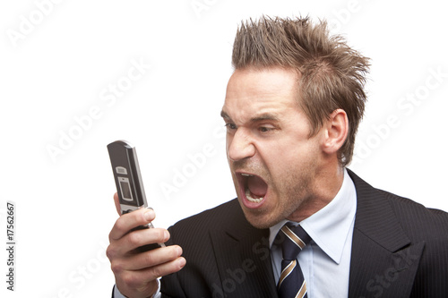 Foto: Businessman has stress - Mann schreit ins Telefon Businessman has stress - Mann schreit ins Telefon