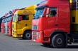yellow and red semi trucks
