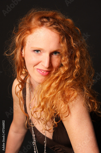 Photo: girl with pretty curly red hair girl with pretty curly red hair