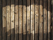 Photo: Old wooden half painted brown fence Old wooden half painted brown fence
