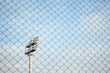 A metal halide gas discharge lighting system behind the net A metal halide gas discharge lighting system behind the net