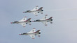 The U.S. Air Force F-16 Thunderbirds fly in diamond formation