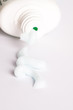 Cream spilled from the bottle closeup