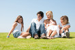 Photo: Adorable family relaxing Adorable family relaxing