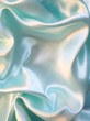 Smooth elegant blue silk as background Smooth elegant blue silk as background