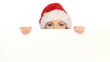 Girl in santa claus hat holding empty board