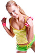 pink dumbbells in the hands of women