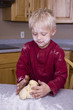 Boy making dough