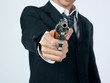 arme a feu et homme d'affaires