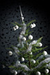 Silver decorated Christmas tree with balls and chains