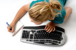 young women with keyboard and pen writing