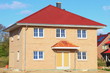 Neubau Einfamilienhaus Dachstuhl Rohbau blauer Himmel