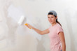 Young woman decorate her new apartment