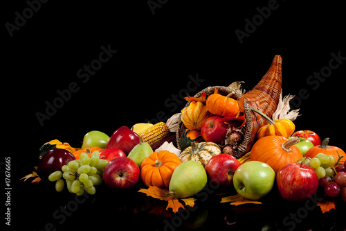 Photo: Fall arrangement of fruits and vegetables in a cornucopia Fall arrangement of fruits and vegetables in a cornucopia
