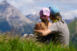 Photo: Couple enjoying a mountains view Couple enjoying a mountains view