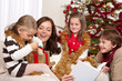 Happy family: mother with three children
