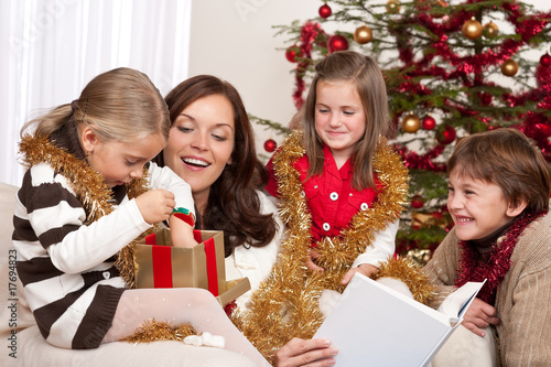 Photo: Happy family: mother with three children Happy family: mother with three children
