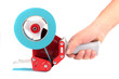 Red pistol with an adhesive tape in a hand