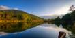 Foto: Riflessi sul lago al tramonto in autunno Riflessi sul lago al tramonto in autunno