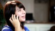 A Happy Pretty Teeage Girl Talking on Cell Phone.