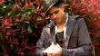 Video: Young man reading in street Young man reading in street