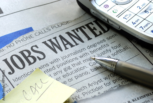 Searching for a job from a newspaper Searching for a job from a newspaper