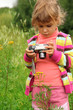 little girl with photo camera outdoor little girl with photo camera outdoor