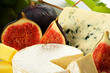 Various types of cheese and fruits