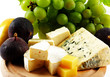 Various types of cheese and fruits