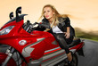 one blonde on a motorcycle