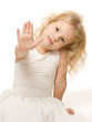 Little girl giving a stop sign with her hand - isolated