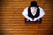 Portrait of the mime in a make-up on wood background