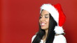 Portrait of beautiful sexy girl wearing santa claus hat