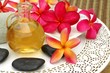 Massage oil and flowers Massage oil and flowers