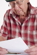 Senior man holding paper