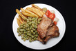 Pork chop chips and peas. Pork chop chips and peas.