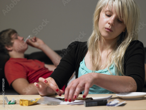 Photo: Teenage Couple Taking Drugs At Home Teenage Couple Taking Drugs At Home