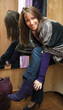 Young beautiful woman in fitting room.