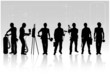 Construction workers with tools on technical background Construction workers with tools on technical background