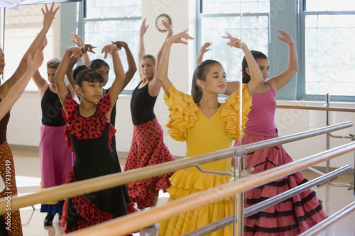 Photo: Reflection of young girls in dance class Reflection of young girls in dance class