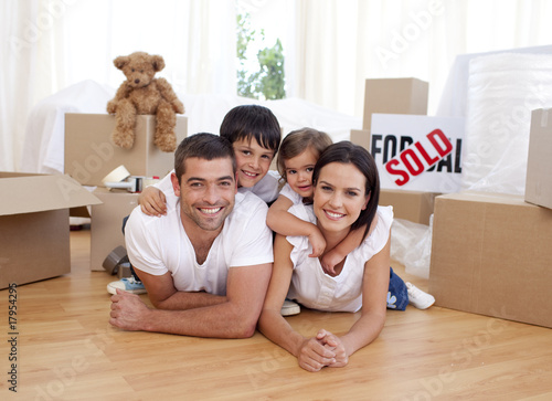 Photo: Happy family after buying new house Happy family after buying new house