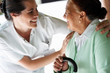 Happy young nurse with an old patient Happy young nurse with an old patient