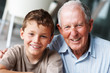 Portrait of a happy senior man with grandson