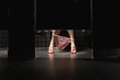 Woman with underwear around ankles in restroom stall